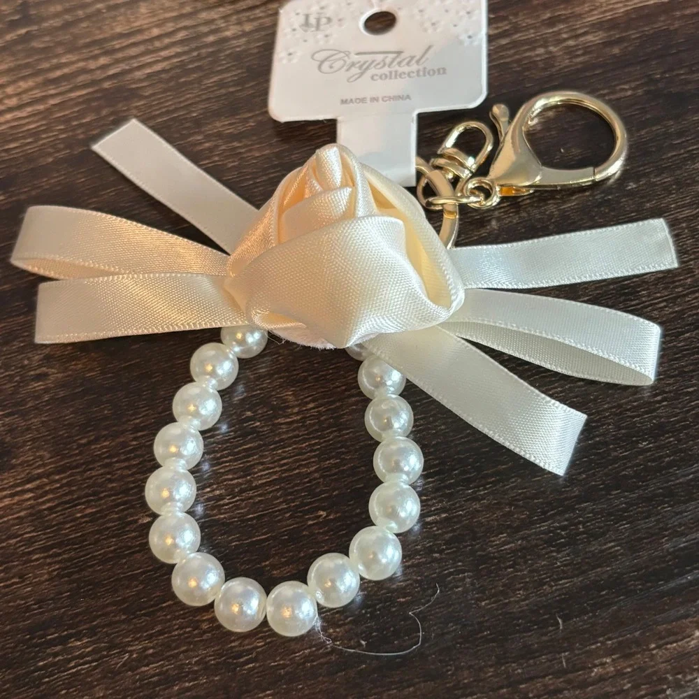 Crystal Collection Ivory Satin Rose Faux Pearl Bow Keychain Gold Tone Clasp